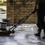 A person doing vacuum cleaning